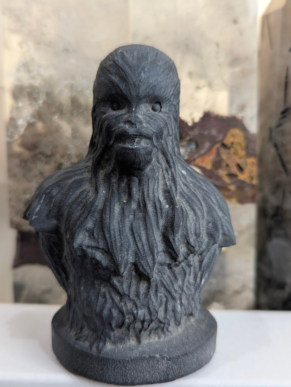 Frontal view of matte black obsidian Chewbacca bust.