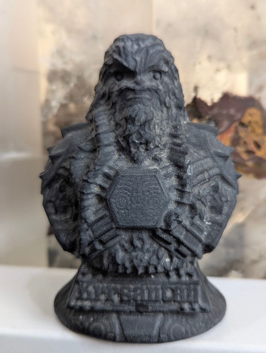 Front view of matte obsidian Korsan character bust.