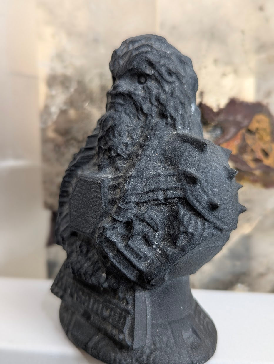 rofile of obsidian Korsan bust showing