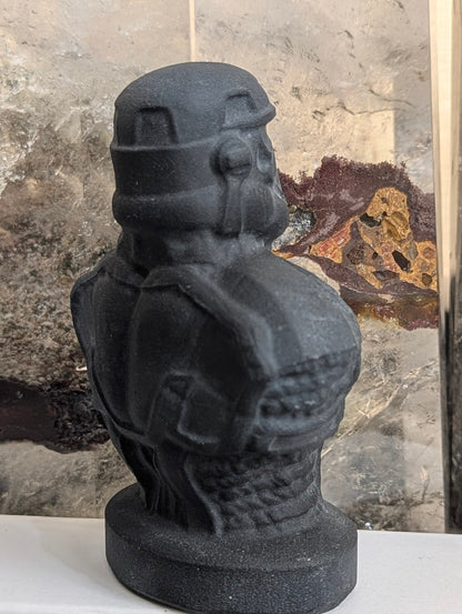 Three-quarter view of matte obsidian Stormtrooper showing helmet detail.