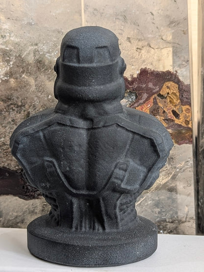 Rear view of matte black volcanic glass Stormtrooper carving.