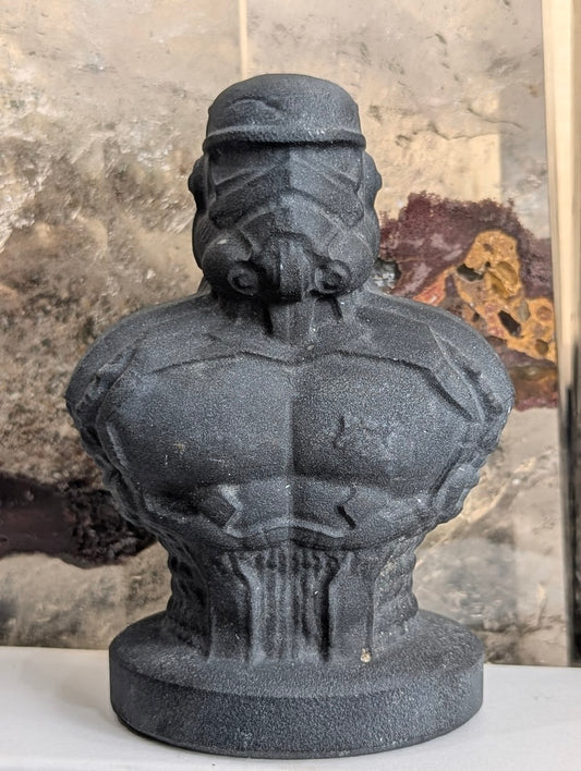 Front view of matte black obsidian Stormtrooper bust carving.