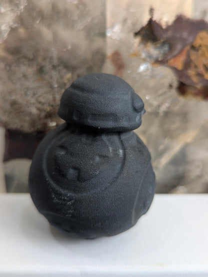 Angled view of matte volcanic glass BB-8 droid.