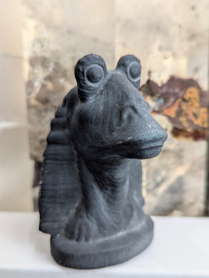 Frontal view of matte obsidian Jar Jar Binks character bust.