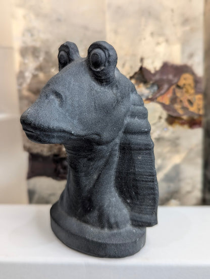 Profile view of hand-carved obsidian Jar Jar Binks showing ear detail.
