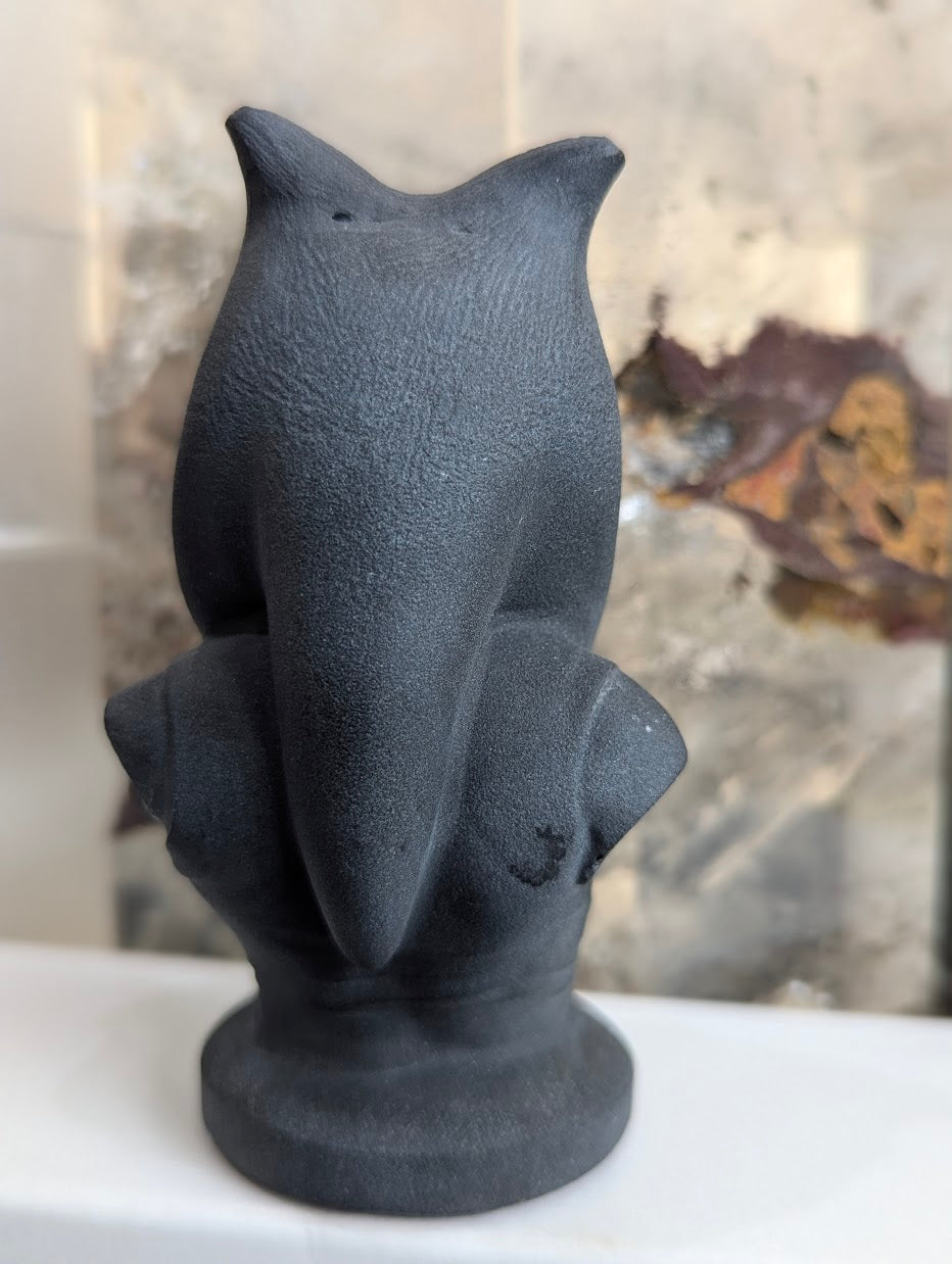 Rear view of hand-carved obsidian Ahsoka Tano bust.