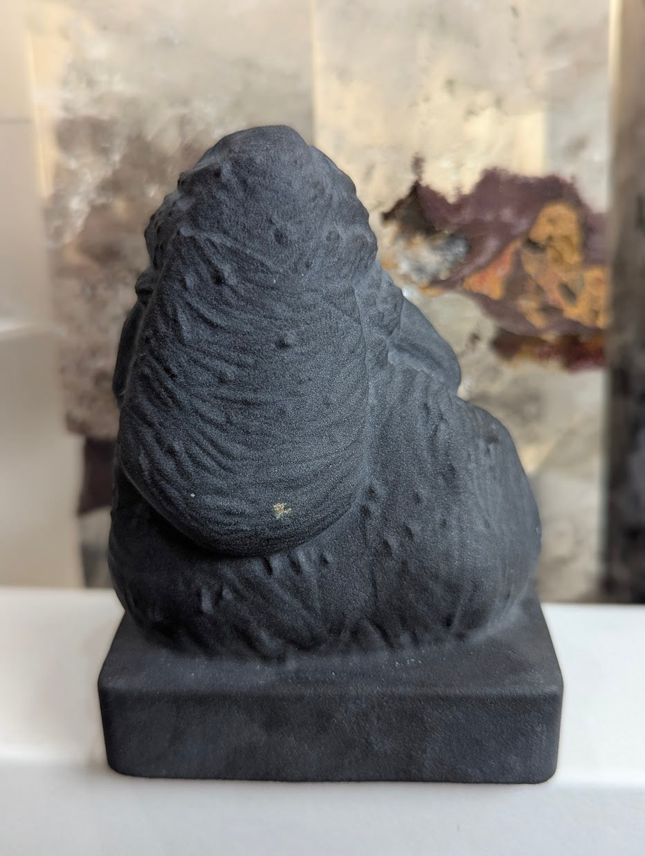 Rear view of matte volcanic glass Jabba the Hutt carving.