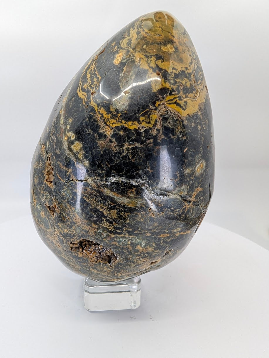 Side view of ocean jasper egg piece B with strong banding