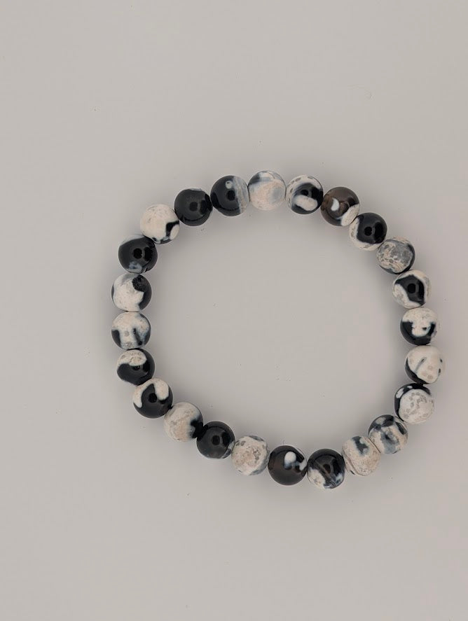Top view of Orca Agate 8MM round bead stretch bracelet
