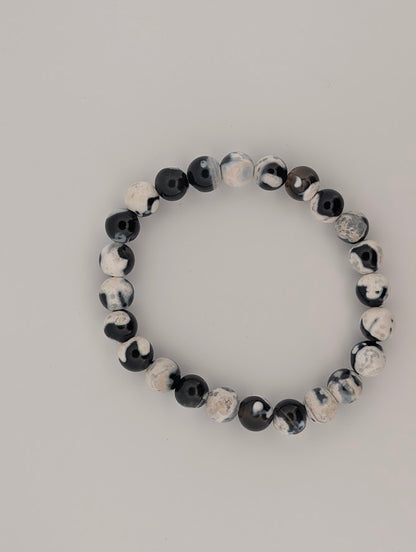 Top view of Orca Agate 8MM round bead stretch bracelet