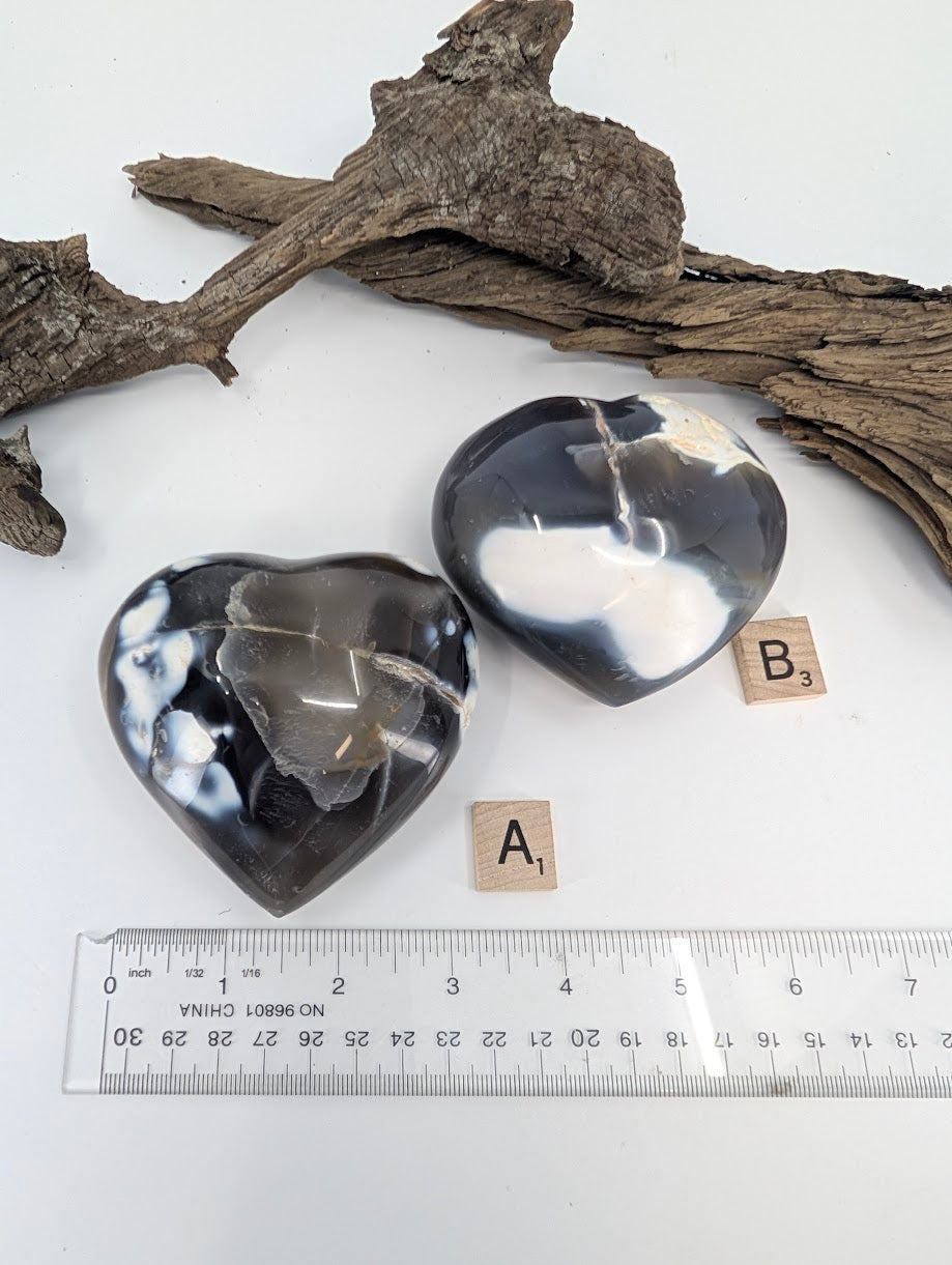 Comparison of Orca Agate hearts Specimen A (365g) and Specimen B (315g) with ruler for scale