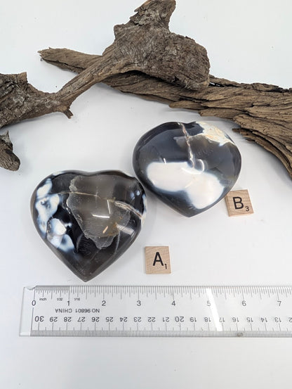 Comparison of Orca Agate hearts Specimen A (365g) and Specimen B (315g) with ruler for scale