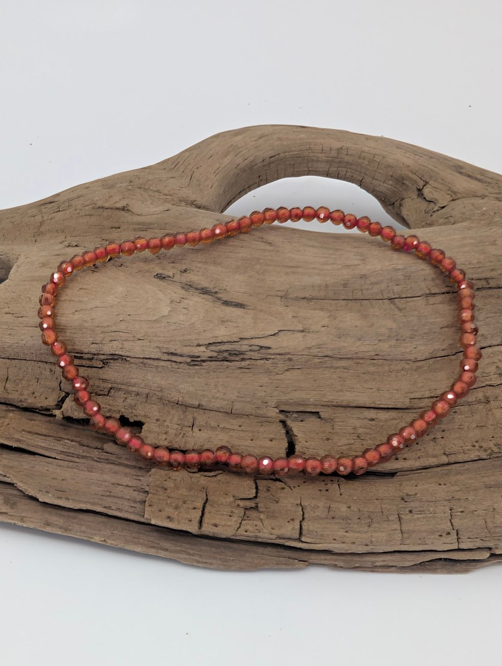 2.8 mm faceted Peach Garnet bracelet with soft amber tones