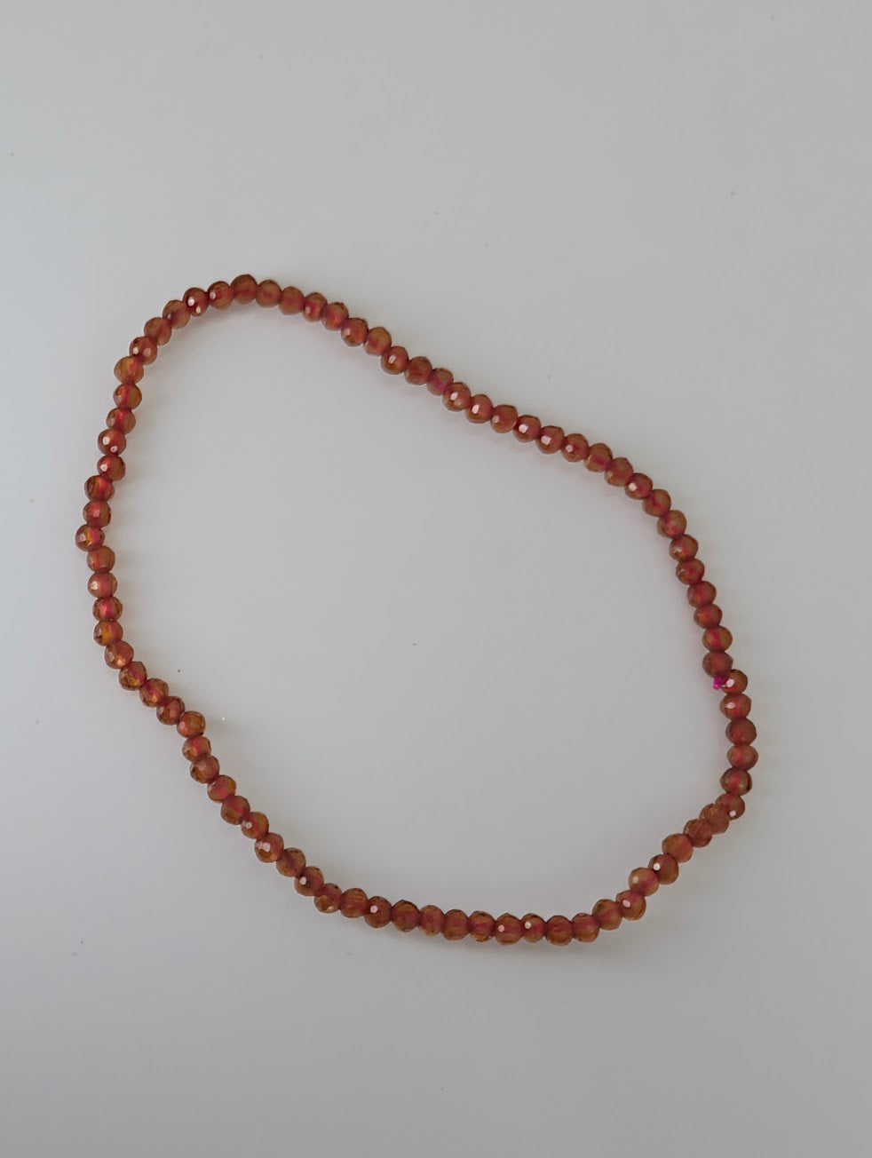 Natural faceted Peach Garnet bracelet on stretch cord