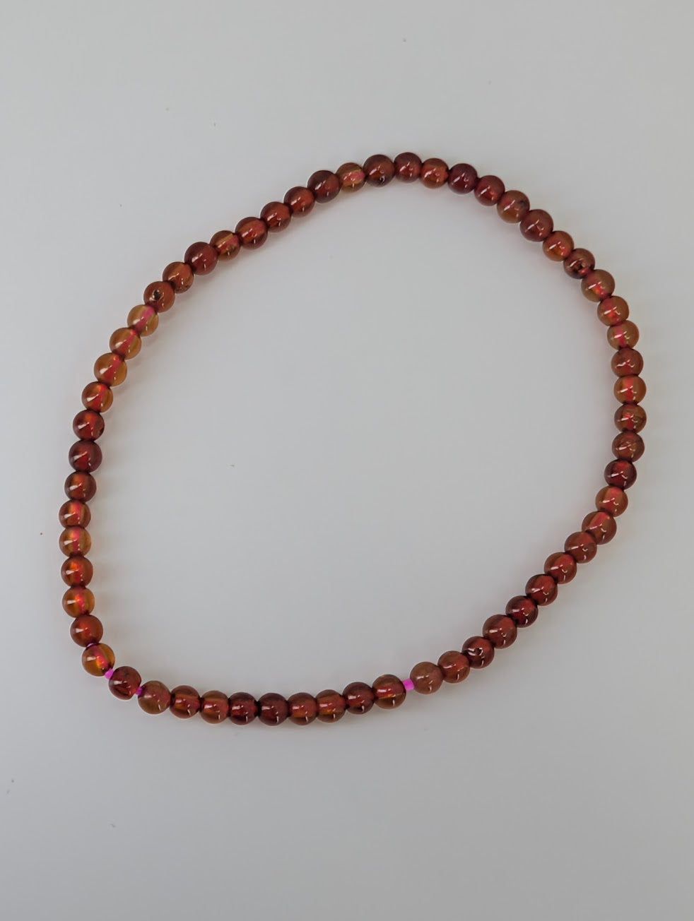 3mm peach garnet bracelet with apricot tones on stretch cord