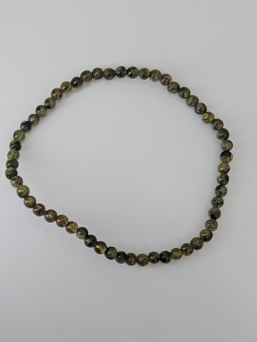 3.7 mm peridot bracelet with translucent green round beads