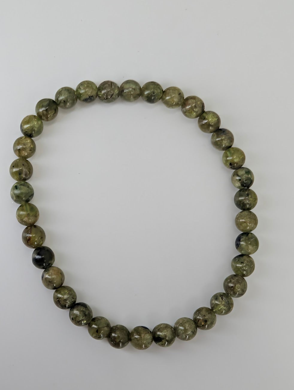 5 mm peridot bracelet with natural green round beads on stretch cord