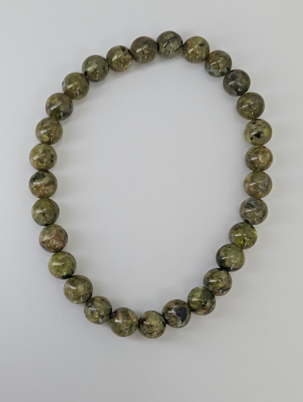 6 mm peridot bracelet with even color and smooth polish