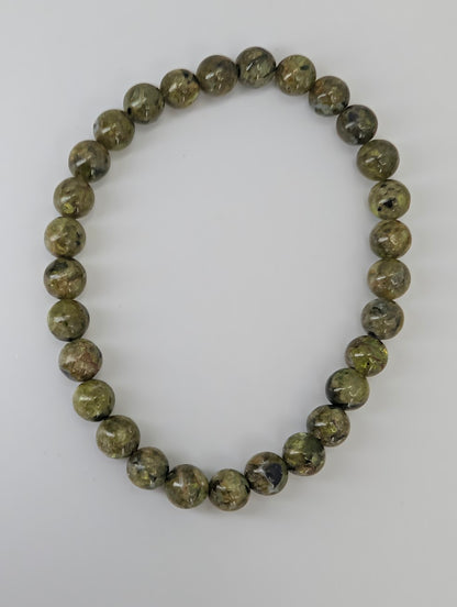 6 mm peridot bracelet with even color and smooth polish