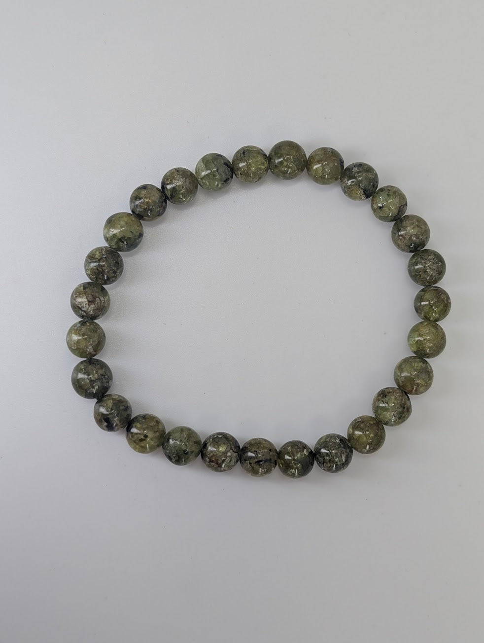 7 mm peridot bracelet with gemmy green beads and high shine