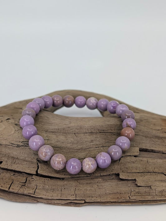 8mm Phosphosiderite bracelet in natural light showing lilac tones and soft polish