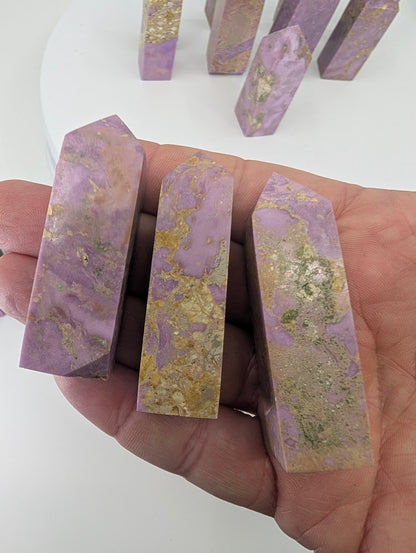 Front view of mini phosphosiderite towers in soft purple tones