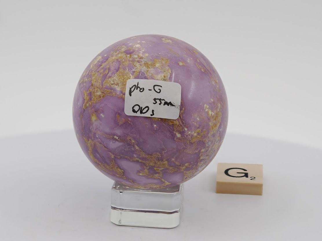 Petite 55mm Phosphosiderite sphere with a consistent pastel lavender glow and fine matrix web.