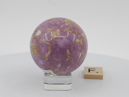 58mm Phosphosiderite sphere showing detailed golden-yellow cacoxenite inclusions within orchid-purple stone.
