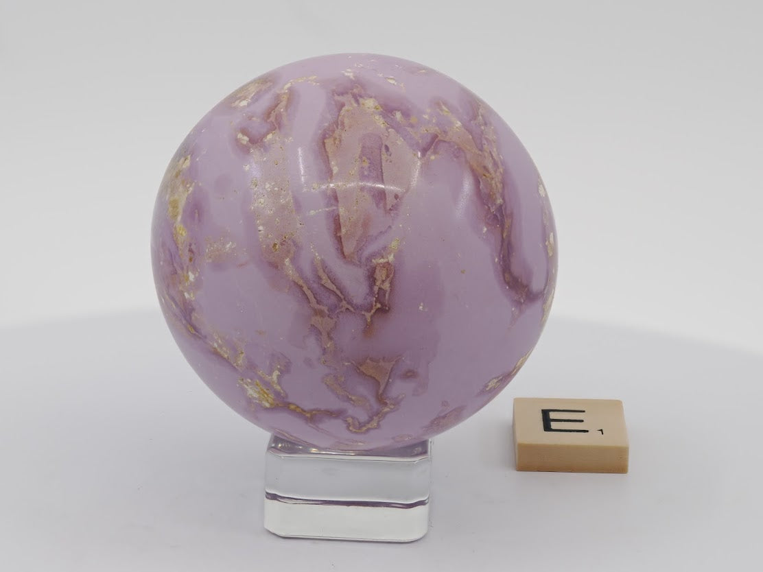 High-vibration 60mm orchid-purple Phosphosiderite sphere, ideal for meditation and heart chakra work.