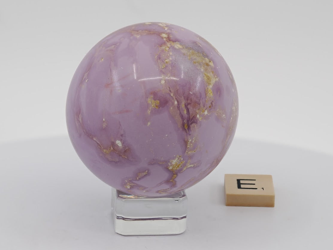 Polished 60mm Phosphosiderite sphere displaying a consistent and pure lilac-purple hue.