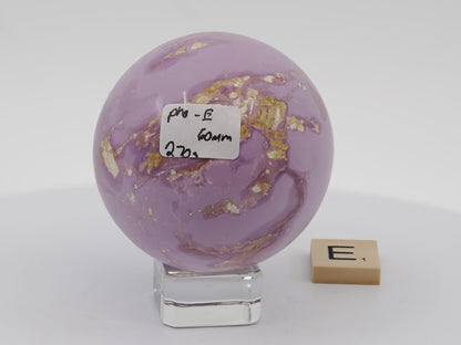 Gem-grade 60mm saturated orchid-purple Phosphosiderite sphere with minimal matrix.