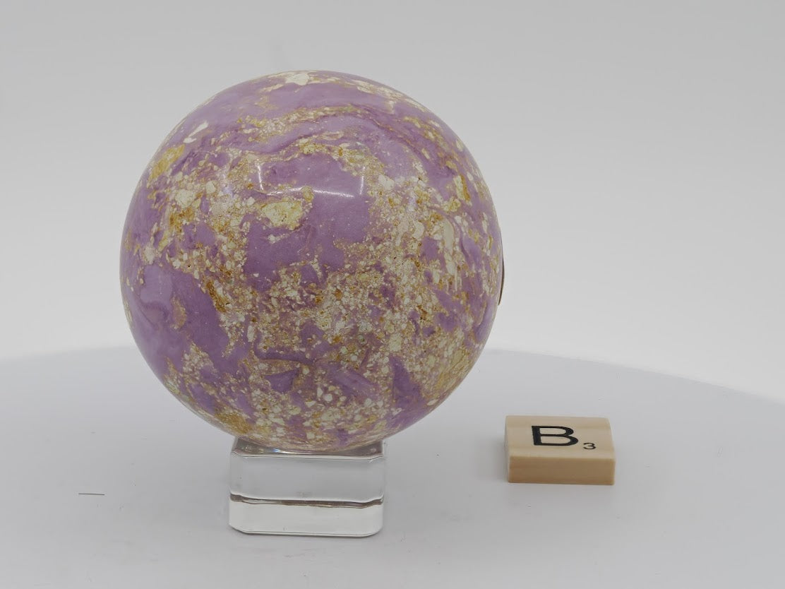 High-luster 61mm Phosphosiderite sphere featuring swirling lavender and pastel purple tones.