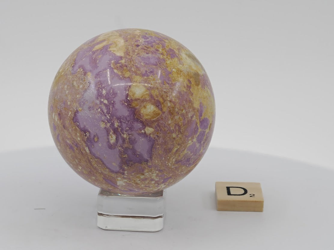 62mm Phosphosiderite sphere from Chile with cloud-like purple patterns and earthy tan matrix.