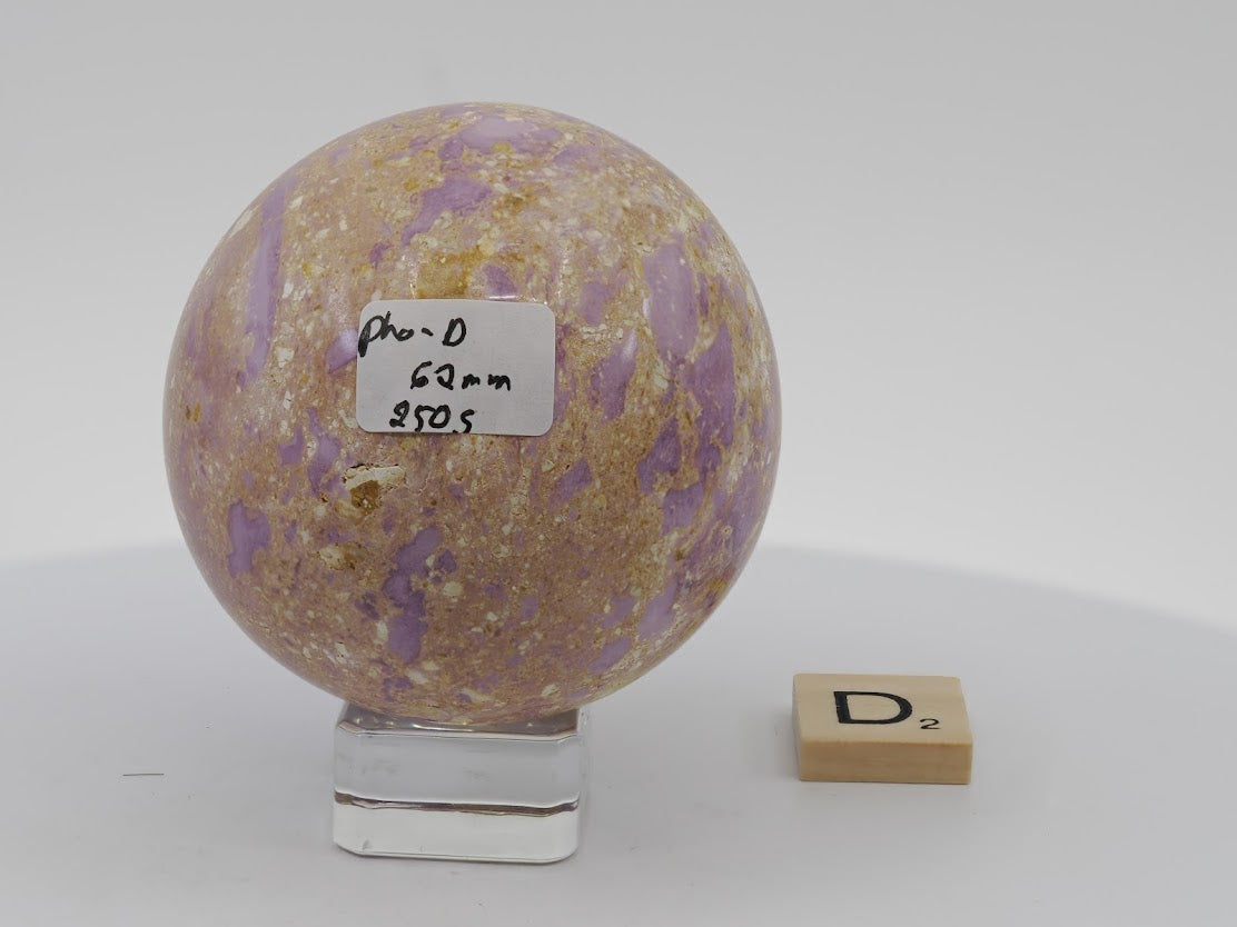 62mm lilac Phosphosiderite sphere with dramatic landscape-style tan matrix inclusions.