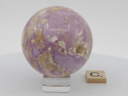 Collector-grade 63mm Phosphosiderite sphere showing natural iron phosphate mineral structure.