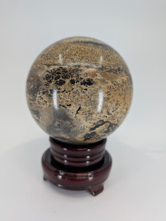 Picture Jasper sphere showing scenic desert-like banding and earthy tones