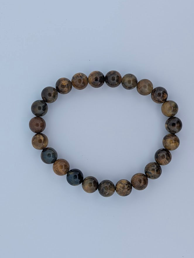 Top-down view of 8mm Pietersite bracelet in a circle