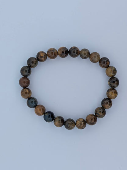 Top-down view of 8mm Pietersite bracelet in a circle