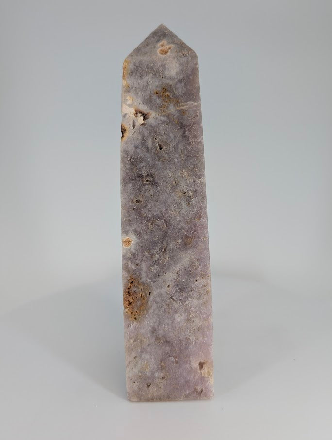 Pink Amethyst Tower from Brazil showing lilac tones and natural vugs