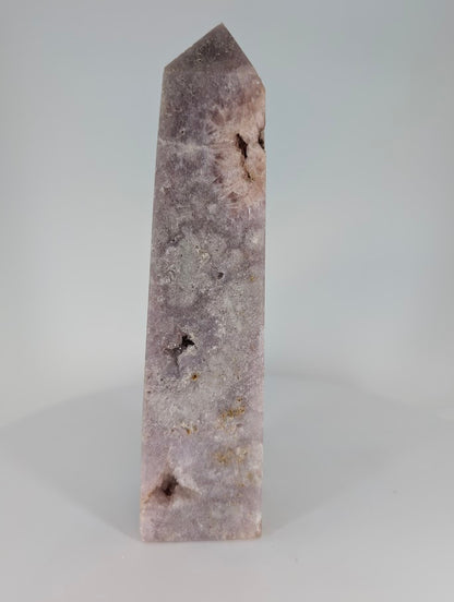 Side view of Brazilian Pink Amethyst tower with crystalline texture