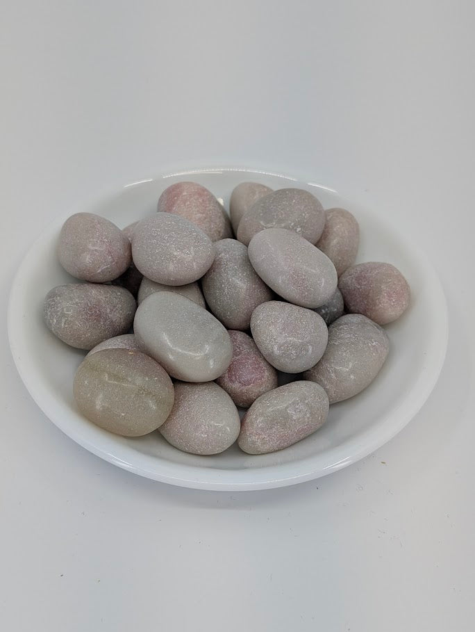 Pink Opal tumbled stones A grade in bowl