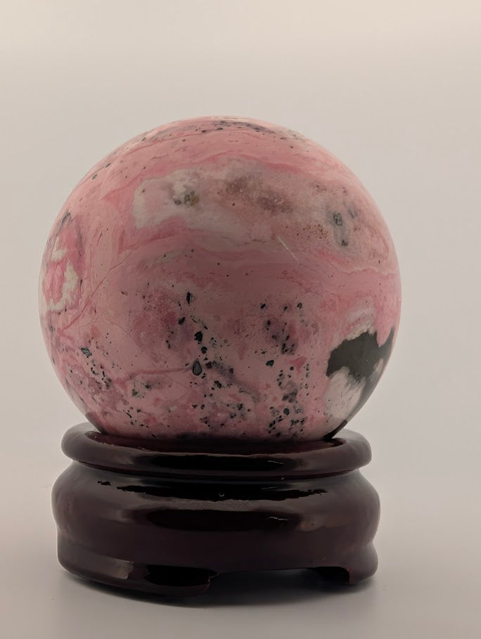 Rear angle displaying pink-and-beige transitions