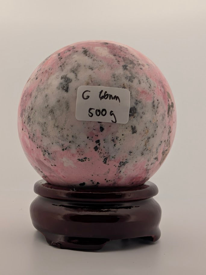 60 mm 500 g Pink Peruvian Rhodonite sphere with identification label