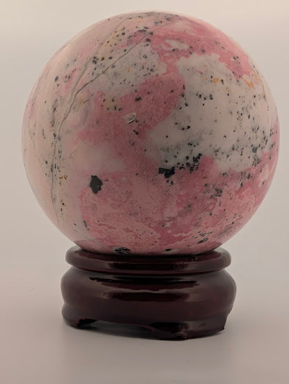 Polished surface showing organic inclusions and cavity