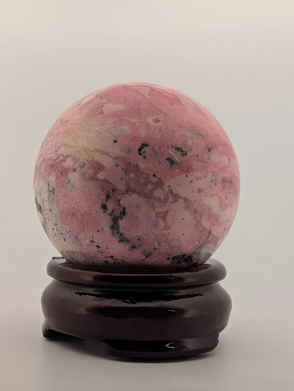 Side angle highlighting pink and cream blending with black accents