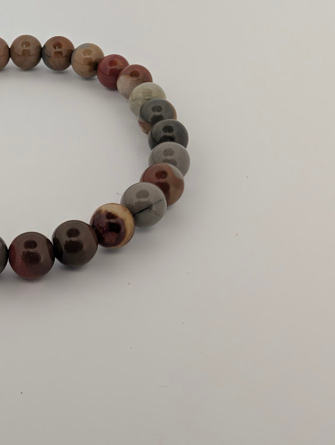 Detail of 6MM Polychrome Jasper bracelet with mixed desert hues