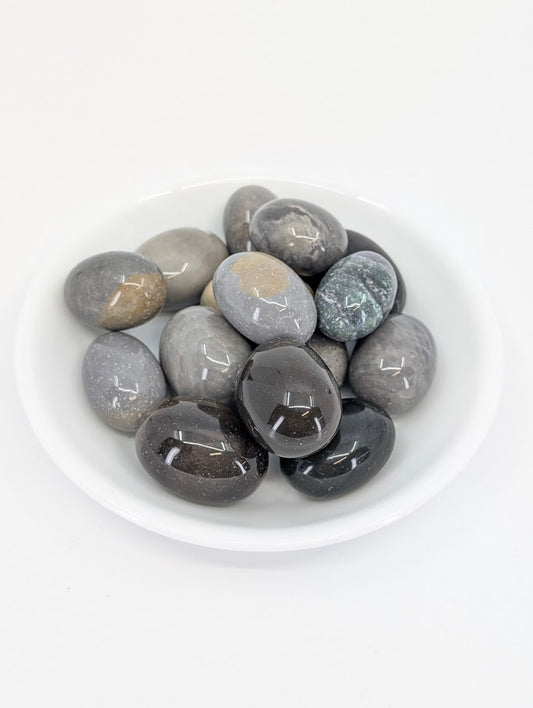 Polychrome Jasper tumbled stones A grade in bowl
