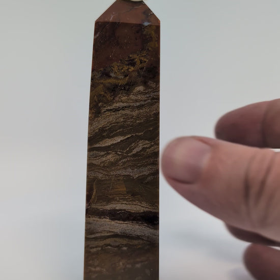 Ocean Jasper Tower OJ-01 video – 12.4 cm, 220 g, brown and tan orbicular patterns from Madagascar. Hand-polished tower showing natural surface details and banding.