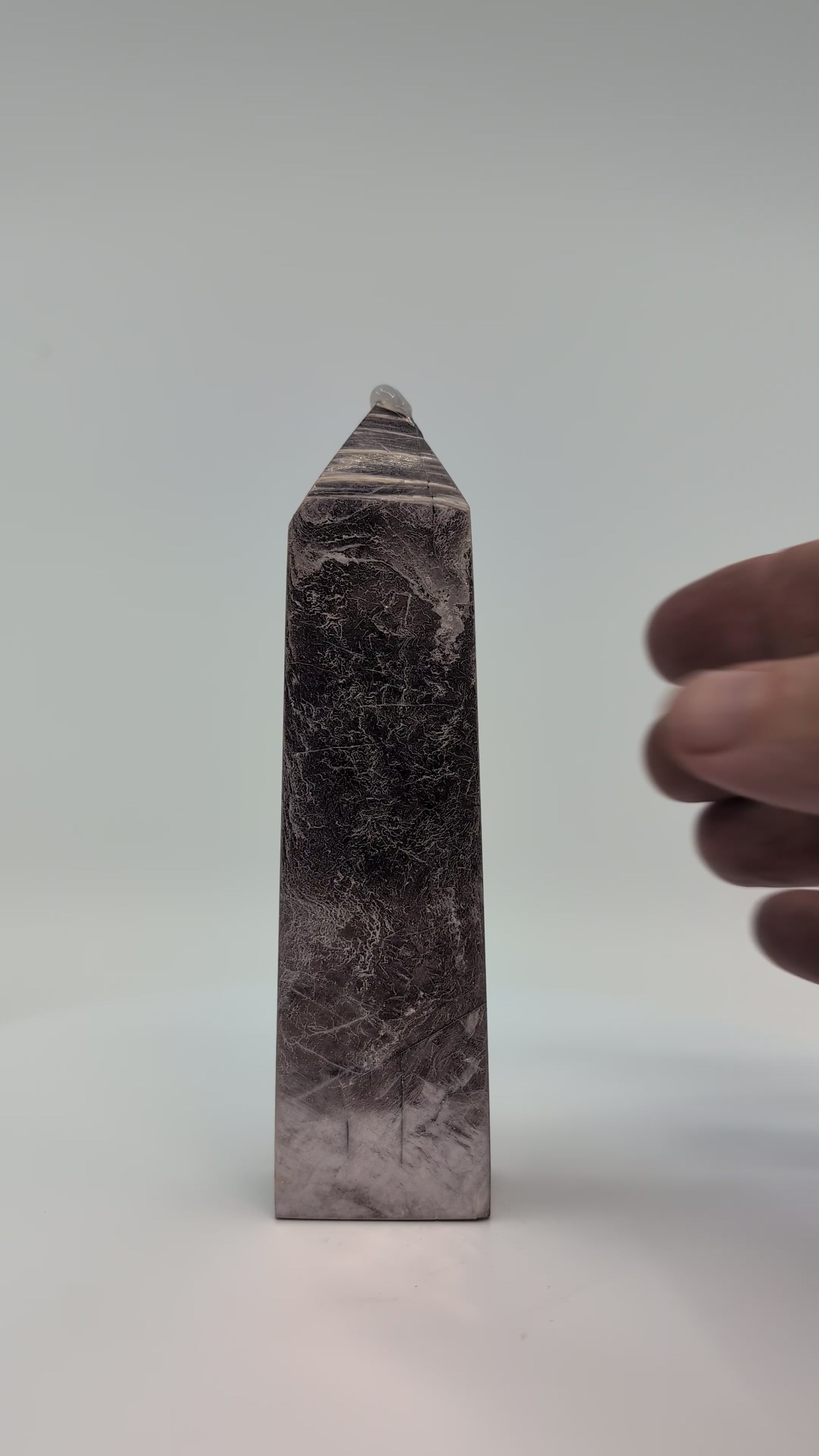360° rotation video of polished Lepidolite tower (Purple Mica) from Minas Gerais, Brazil, showing lavender shimmer, layered mica texture, and smooth reflective finish.