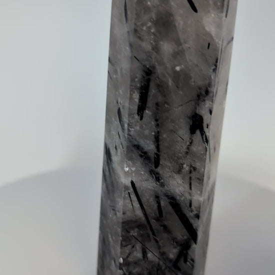 360-degree view of 17 cm Black Tourmaline in Quartz tower from Brazil showing full polish and inclusion density.
